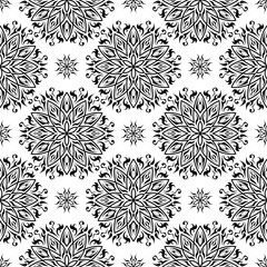  Seamless background. Black geometric print on white background