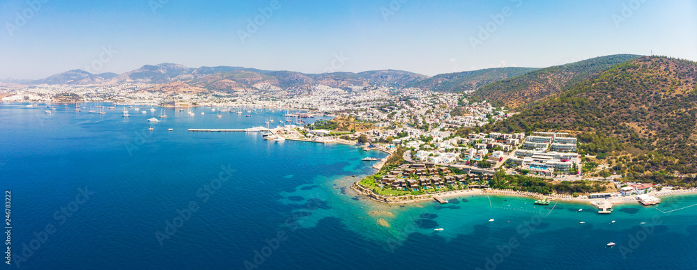Panoramic aerial view of sunny Bodrum with resorts and beachfront villas - obrazy, fototapety, plakaty 