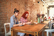 © luckybusiness - two students learning together