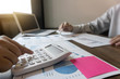 © Ngampol - Professional Business colleague team working and analyzing with new project, Idea presentation and meeting strategy plan of financial business investment