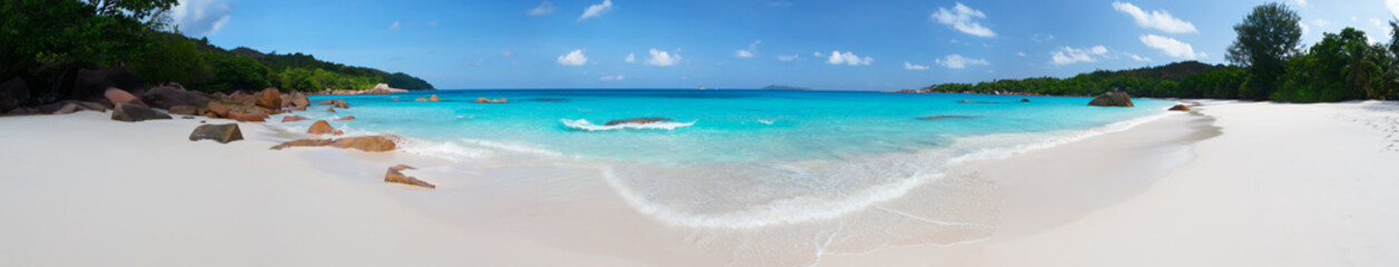 Panorama of the beach with big stones and white sand