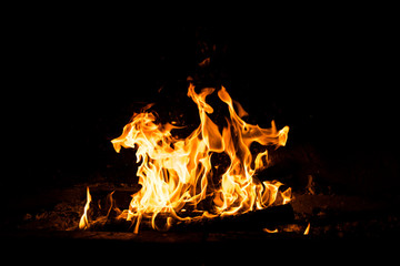 Fire flames burning isolated on black background. High resolution wood fire flames collection smoke texture background concept image.