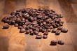 Roasted coffee beans on a wooden table