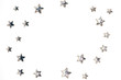 © LanaUst - Beautiful shining silver stars with embossed transparent top arranged in circle on isolated white background. Copy space. Top view.