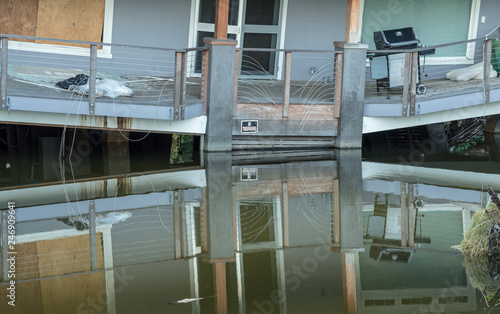 Cuadros en Lienzo Balcony of beach home sinking into sink hole after the massive rain storms of Ap