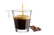 Black coffee in glass cup with coffee beans and  jumping drop on white background
