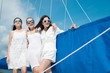 © bhakpong - Lifestyle series: Group of Asian women on catamaran yacht