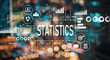 © Tierney - Statistics with blurred city abstract lights background