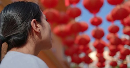 Sticker - Young Woman look at the red lantern for lunar new year