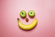 Banana And Apples Smiley On Pink Fashion Background With Space For Text