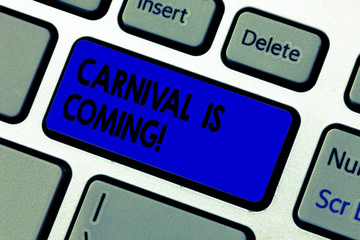 Conceptual hand writing showing Carnival Is Coming. Business photo text public festival which showing play music and dance Keyboard key Intention to create computer message idea