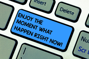 Handwriting text writing Enjoy The Moment What Happen Right Now. Concept meaning Seize the day Relax Leisure Keyboard key Intention to create computer message pressing keypad idea