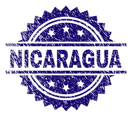 Wall Mural - NICARAGUA stamp seal watermark with distress style. Blue vector rubber print of NICARAGUA caption with corroded texture.