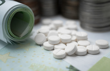 Wall Mural - pill with medicines, drugs, on money banknotes, macro closeup