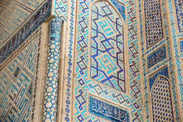 The Shah-i-Zinda Ensemble mausoleums. Symmetrical decorative ornament on wall. Samarkand, Uzbekistan