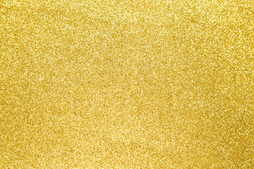 Wall Mural - golden glitter shiny texture background for christmas, celebration concept.