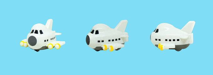 White small airplane toys isolated on blue background.