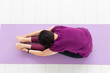 © satura_ - Yoga, people concept - a middle-aged woman doing a yoga and try to do a asana, top view