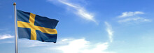 Flag Of Sweden Rise Waving To The Wind With Sky In The Background