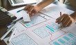 © Chaosamran_Studio - ux Graphic designer creative  sketch planning application process development prototype wireframe for web mobile phone . User experience concept.