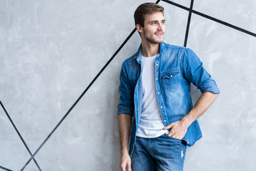 Wall Mural - Perfect man. Portrait of happy fashionable handsome man in jeans shirt.