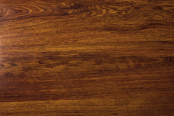 Wall Mural - Polished wood texture. The background of polished wood texture with a dark amber color