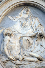 Our Lady of Sorrows, bass relief on the facade of Sant Andrea de Urso church in Rome, Italy  