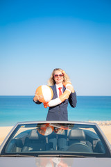 Poster - Successful young businesswoman on a beach