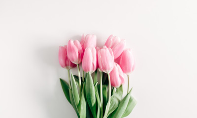 Wall Mural - flowers composition romantic. pink flowers tulips on white background. wedding. birthday. happy woma