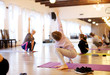 © Robert - children practicing yoga on mats with an instructor
