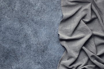 Gray tablecloth from right side concrete table top view. Food background