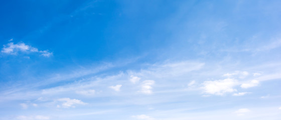 Wall Mural - Clouds on a blue sky as background
