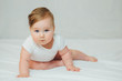 © kaloriya - Cute baby learning to sit up