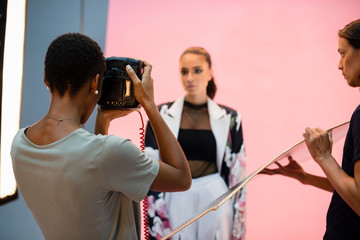 Wall Mural - Young model posing for the camera in a studio