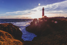 Pigeon Point Lighthouse On Northern California Pacific Ocean Coastline Just Before Sunset With An Artistic Sun Flare, Vintage Look