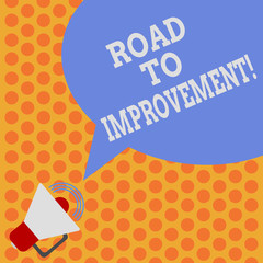 Writing note showing Road To Improvement. Business photo showcasing way that thing makes something better or yourself Megaphone with Sound Volume Icon and Blank Color Speech Bubble photo