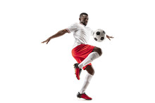 Professional African American Football Soccer Player In Motion Isolated On White Studio Background. Fit Jumping Man In Action, Jump, Movement At Game.