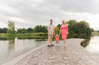 © Илона Удалова - Family walk in the park. Family walks in the park. Man, woman and child in nature.