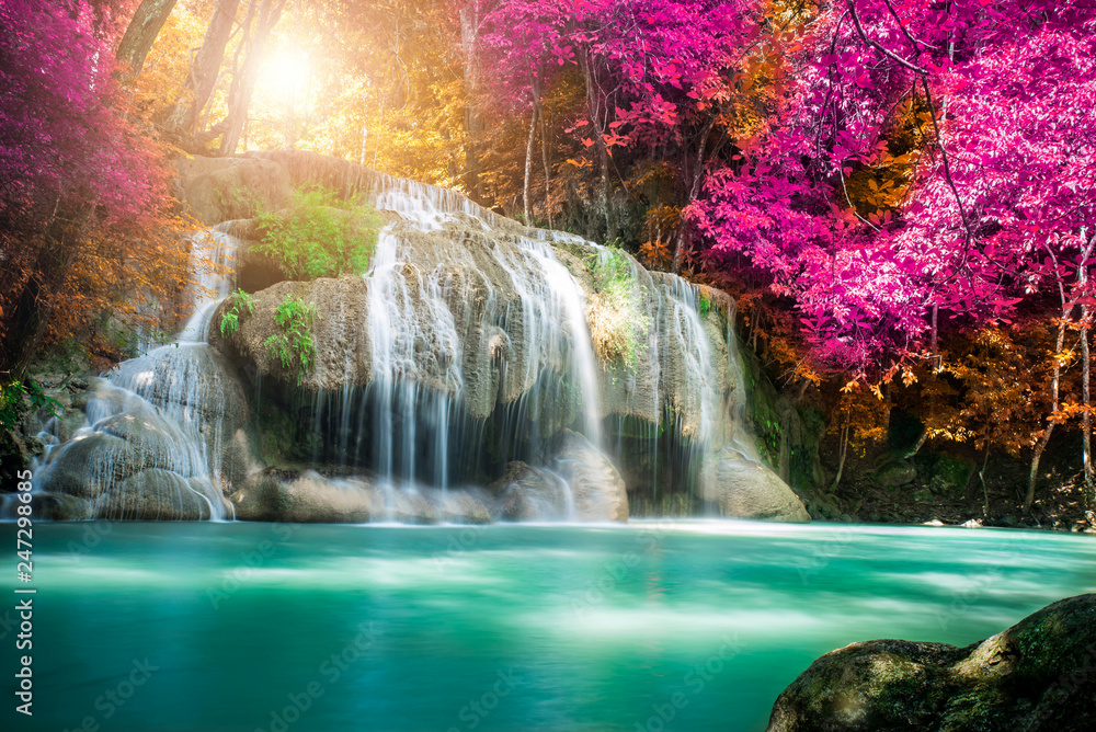 Amazing in nature, beautiful waterfall at colorful autumn forest in fall season  - obrazy, fototapety, plakaty 