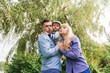 © Илона Удалова - Family walk in the park. Family walks in the park. Man, woman and child in nature.