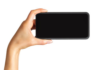 Women's hand showing black smartphone, concept of taking photo