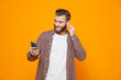 © Drobot Dean - Portrait of a cheerful young man wearing casual clothes