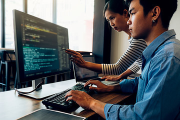 Wall Mural - programmer working in a software development and coding technologies. website design.technology conc