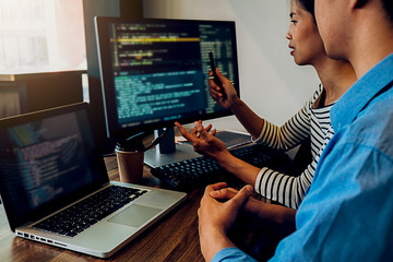 Wall Mural - programmer working in a software development and coding technologies. website design.technology conc