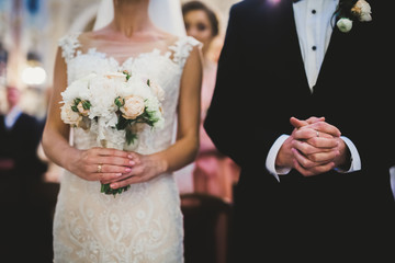 Wedding couple bide and groom get married in a church