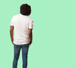 © Asier - Handsome african american showing back, posing and waiting, looking back