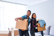 © Dragana Gordic - Excited Young Couple Moving Into New Home Together.