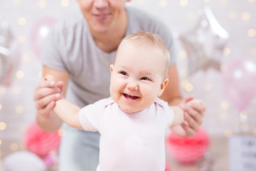 Wall Mural - cute little baby girl and her father