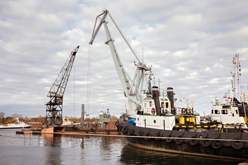  Tugboats and other marine support vessels in port.