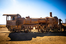 Old Rusty Steam Locomotives Near Uyuni In Bolivia. Cemetery Trains.